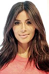 https://upload.wikimedia.org/wikipedia/commons/thumb/d/df/Kim_Kardashian_West_2014.jpg/100px-Kim_Kardashian_West_2014.jpg